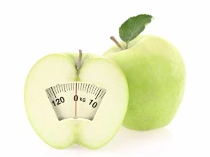 Apple and weighing-scale illustration